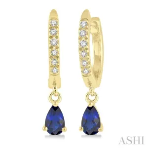 1/8 Ctw Round Cut Diamond & 5x3 MM Pear Cut Sapphire Petite Fashion Huggie Earrings in 10K Yellow Gold