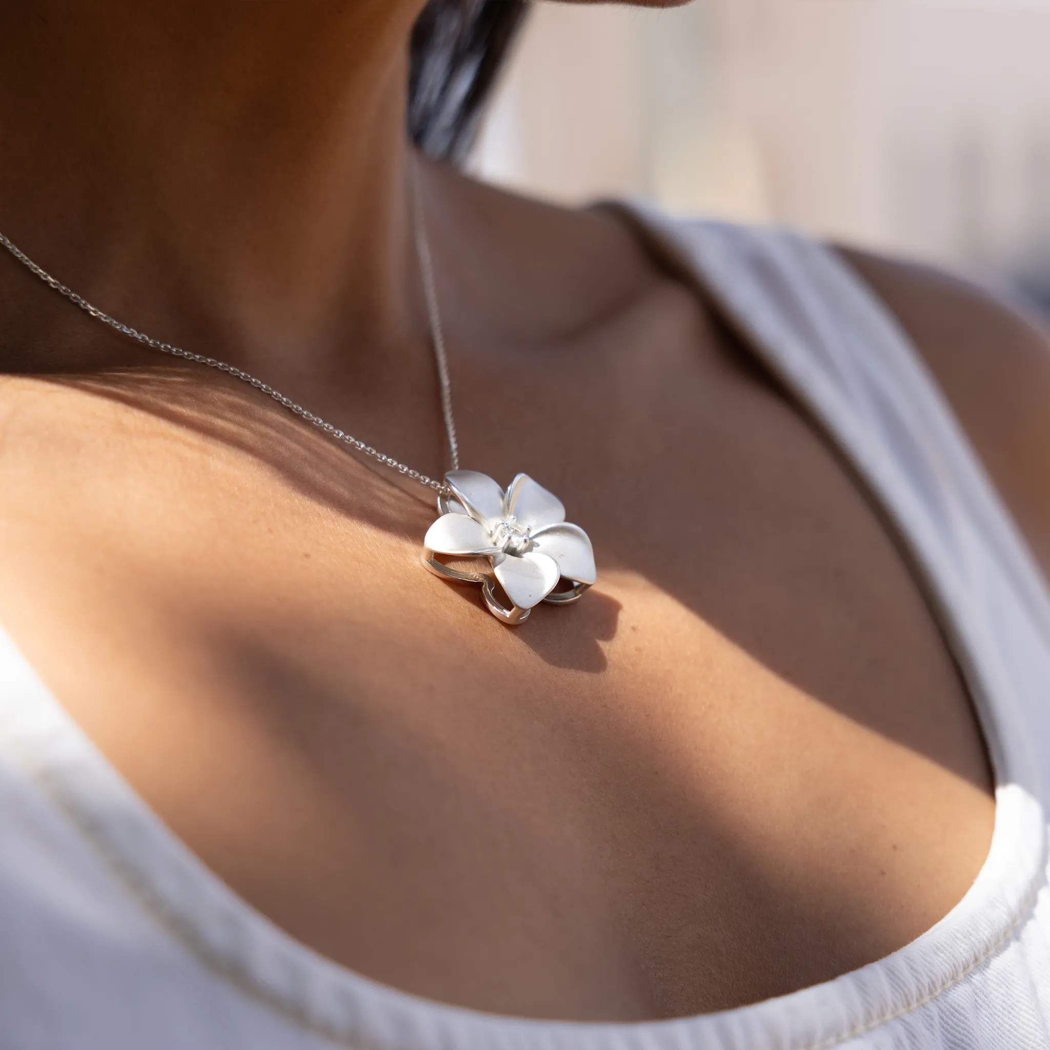 24" Adjustable Plumeria White Sapphire Necklace in Sterling Silver - 28mm