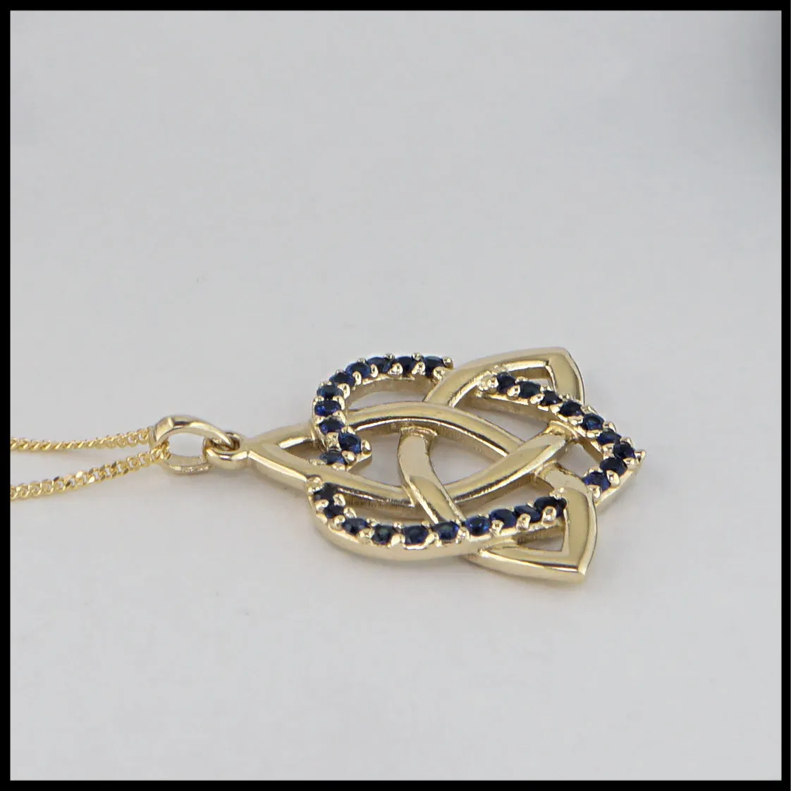 Trinity Knot Heart Pendant with Sapphire